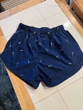 Nike Navy Blue Athletic Shorts with White Swoosh Print